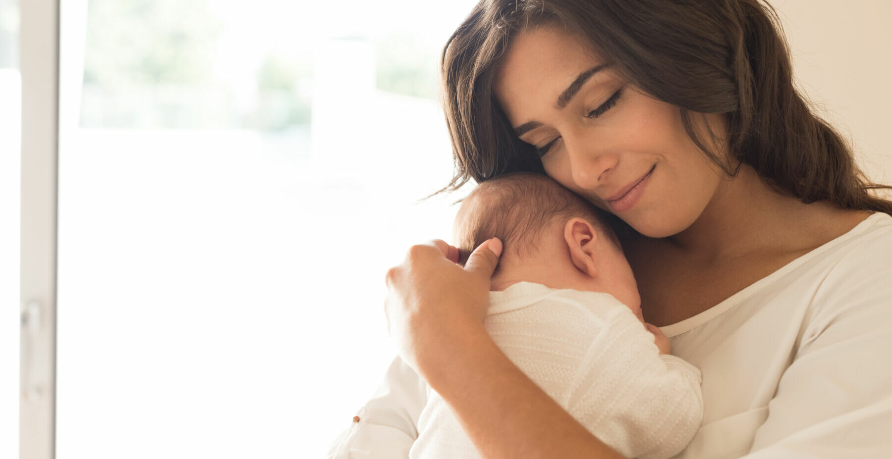 Woman with newborn baby